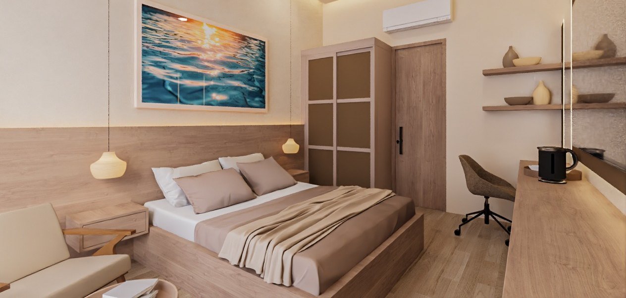 Guest room with ocean artwork and king bed